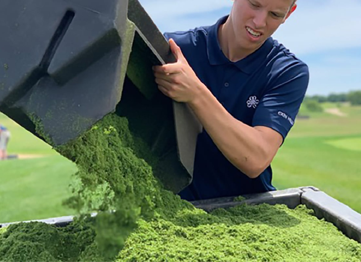 Image of grass clippings being collected