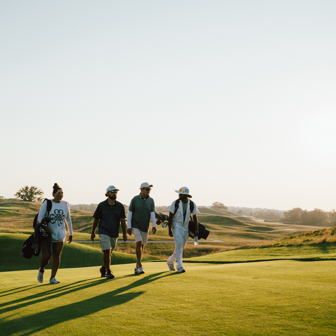 Group of caddies and players